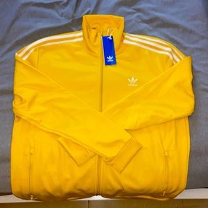 yellow Adidas tracksuit top